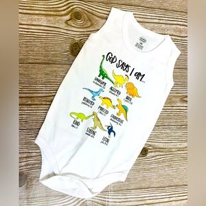 God says I am…18 month baby onesie white with dinosaurs and bible verses